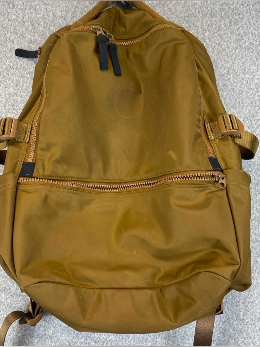 Lululemon Crew Backpack 22L Trail Bronze Logo Missing Fair Condition  Spots